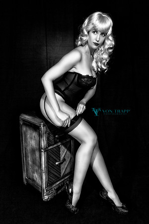 Retro style glamour photo of a woman in lingerie.