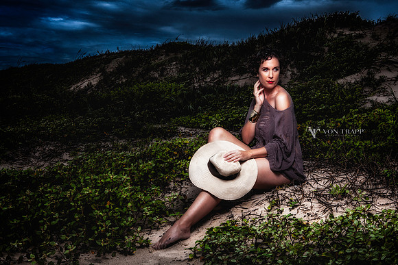 Color fine art photo of a woman posed on a beach dune I Texas.