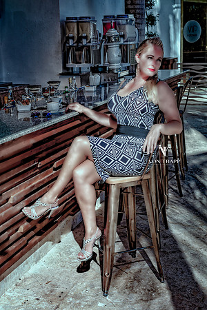 Sexy Irish woman in a dress at an outdoor bar in the Dominican Republic.