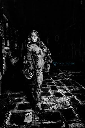 Hot mature woman, photograph in Venice at night wearing sheer black lace, and fuck me pumps.
