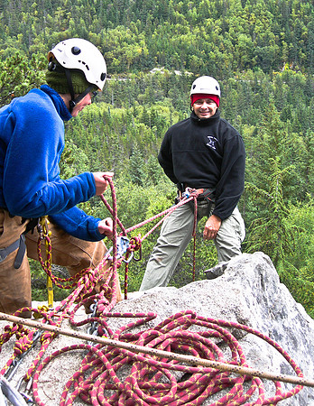 Photo of two people rappelling in Alaska.