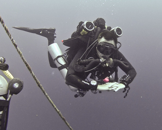 Technical diver on CCR doing a decompression stop in Truk Lagoon.
