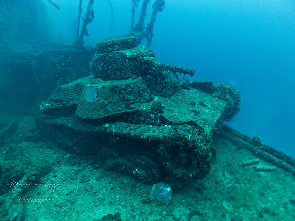 Underwater photo of a WWII Japanese Tank on the deck of a sunken ship at 175 feet in Truk Lagoon, FSM.