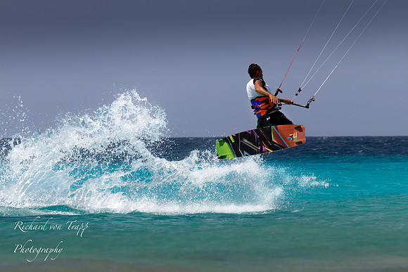 Kite surfing. Kite surfer in Bonaire photographed by San Antonio and Austin Beauty and Glamour Photography.