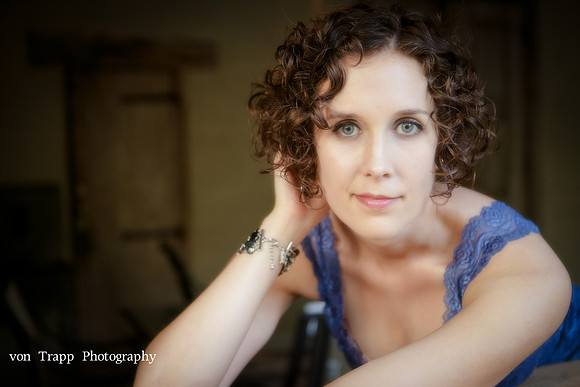 Glamour photo of a beautiful woman with sexy blue eves.