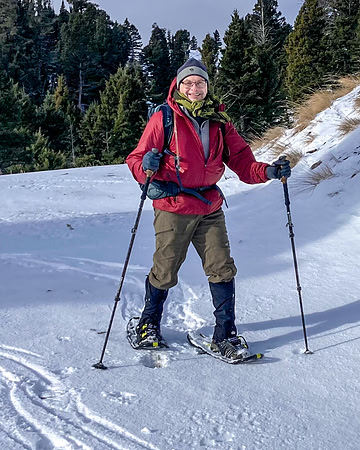 Photo of a man on snowshoes.