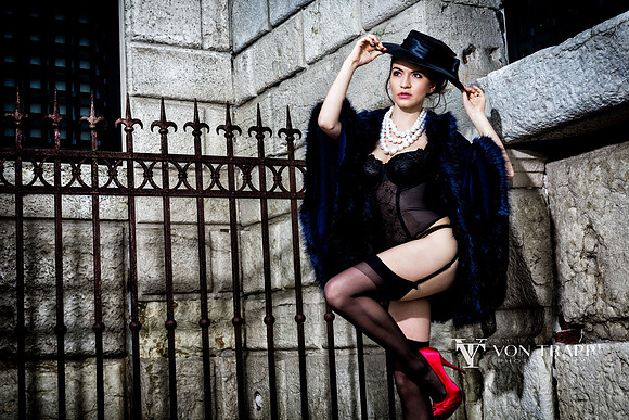 Fashion photo taken outdoors in Venice of a woman wearing lingerie.