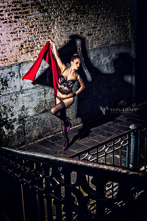 Fashion Photo of a woman in lingerie taken at night on a street in Venice.