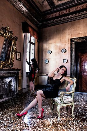Chic fashion image of two women in a Venetian Palazzo.