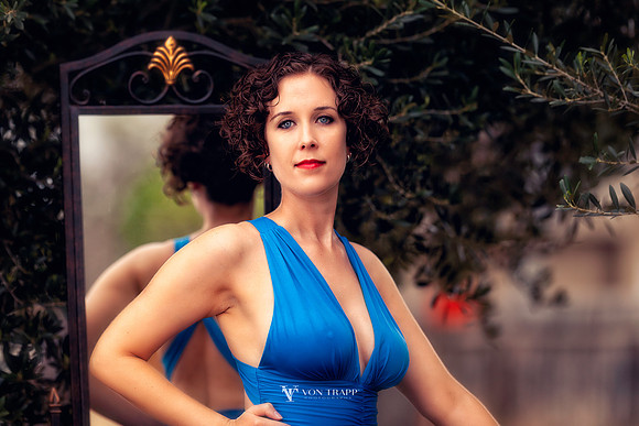 Beauty portrait of a busty woman outdoors.