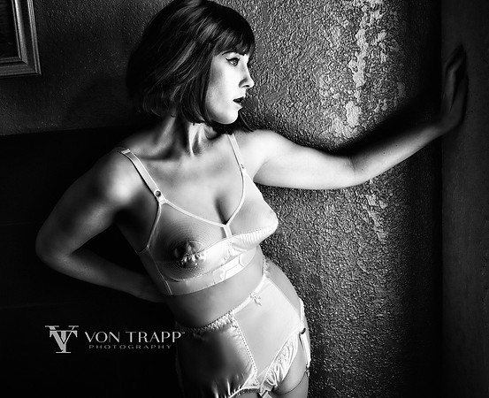 Photo of a woman in retro-inspired lingerie. Bullet Bra.