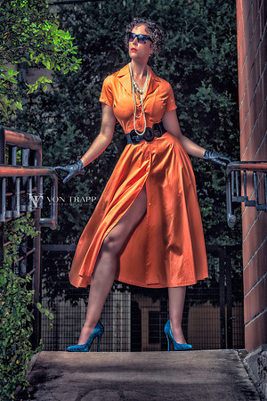 Sexy fashion_glamour photo of a woman in a dress showing lots of leg.