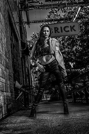 Edgy fashion image of a hot raven-haired woman.