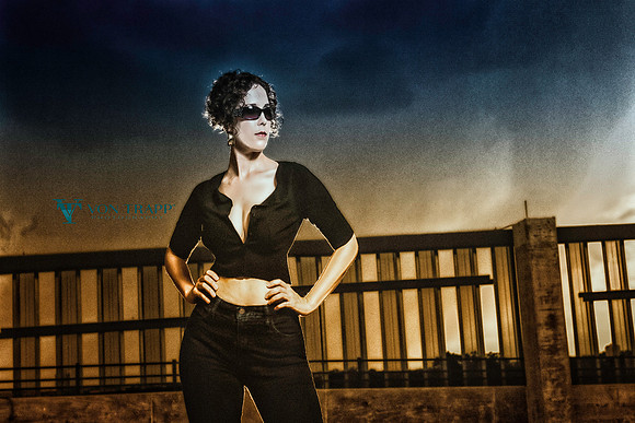 Stylized glamour photo of a woman standing outdoors in San Antonio.