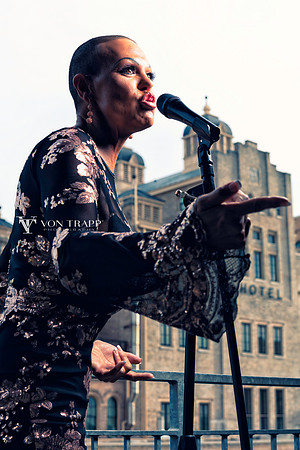 Edgy photo of a bald woman jazz singer in San Antonio.