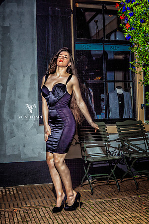 Fashion glamour photo taken at night in Naarden, Holland, of a hot Dutch model wearing an Agent Provoceture dress.
