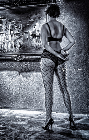 Fashion-Glamour photo of a sexy woman wearing lingerie. Women with a fine ass in fishnet pantyhose.