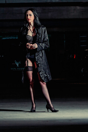 Lingerie glamour photograph of a woman wearing lingerie, posed in a San Antonio parking garage.