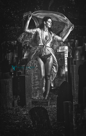 Fine art photo of a woman in lingerie in a Dutch cemetery.