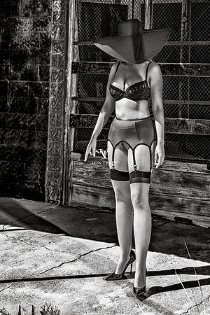 B&W lingerie-glamour photo of a hot woman posed outdoors in West Texas.