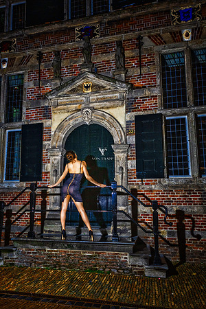 Fashion Glamour photo of a sexy Dutch woman in a revealing dress.