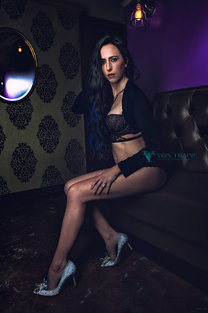 Lingerie glamour photo of Austin author J.M. Buckler.