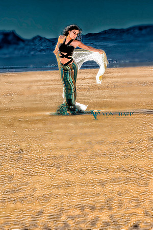 Fine art photo of a sexy and exotic woman appearing from a desert mirage.