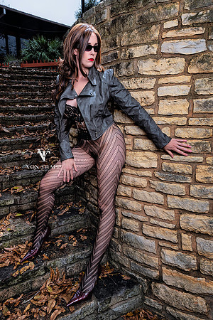 Sexy fashion-glamour photo of a woman flashing in public.