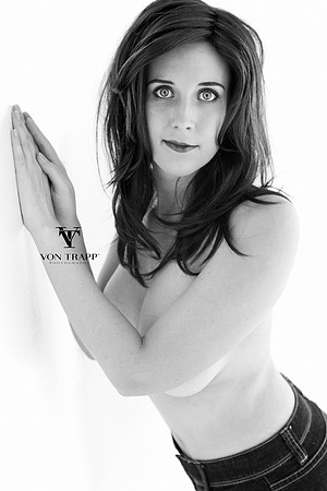 Sexy Glamour photo of a busty topless woman.