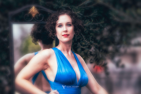Fashion Glamour photo of a busty beauty outdoors.