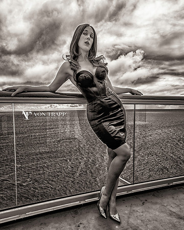 Glamour photo of a sexy woman in an Agent Provocateur dress.