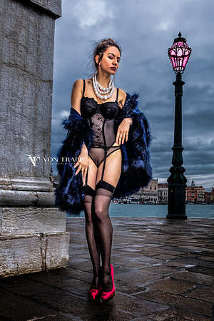 Lingerie photo of a woman outdoors in Venice flashing her pussy in public.
