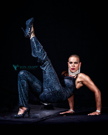 Photo of a sexy bald female singer.