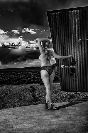 Glamour nude photo of a sexy woman outdoors in New Mexico.
