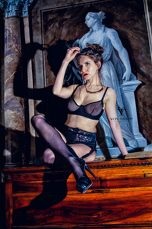 Color Lingerie Glamour pgoto taken in an Italian palazzo of a hot woman in sheer black lingerie.