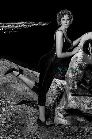 Sexy photo of a hot woman with a fine ass and big boobs wearing spandex in the desert at night above Las Vegas. San Antonio Glamour Photography.