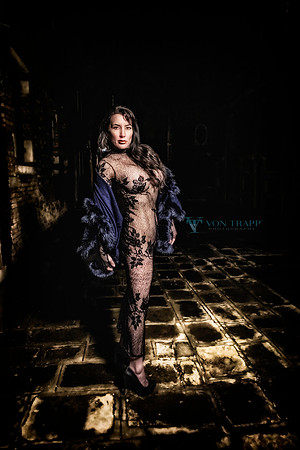 Glamour photo of a woman outdoors at night in Venice.