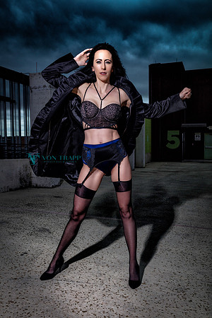Lingerie glamour photo of a woman flashing in a San Antonio parking garage.