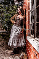 Edgy glamour portrait of a woman in a skirt and bustier.