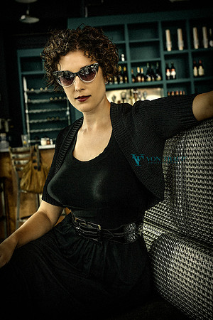 Retro_inspired photo of a woman wearing a bullet bra. Austin Sexy Edgy Evocative Elegant Boudoir Glamour Photography.