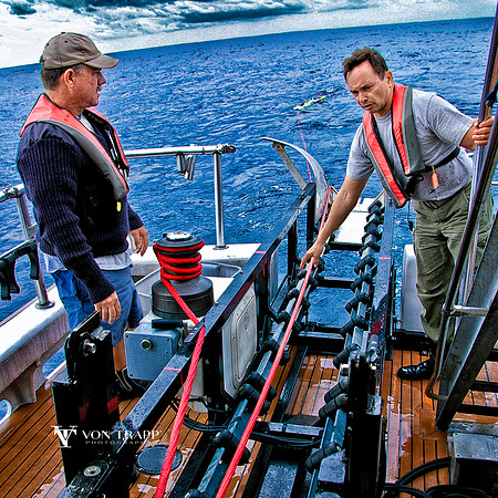Photo of a crew on a boat recovering an autonomous underwater vertical 200 miles off of Florida.