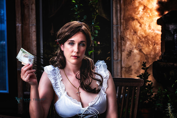 Erotic glamour photo of a woman posing as an Italian "working women", holding a wad of Italian Lire.