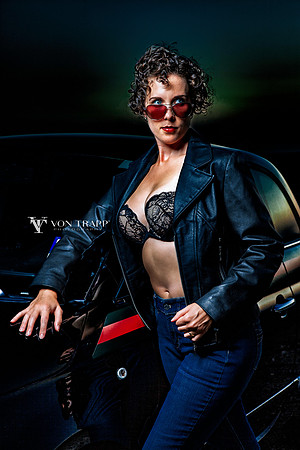 Fashion photo of a sexy woman with a big bust, flashing in public.