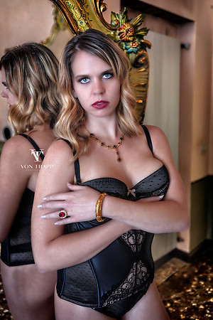 Glamour photo of a lovely blonde wearing lingerie, taken in Venice, Italy.